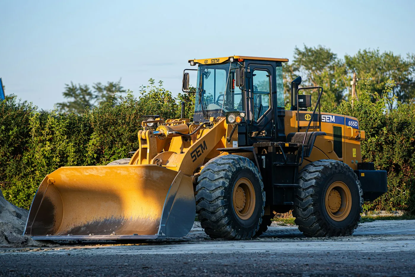 Wheel loader on an open equipment area